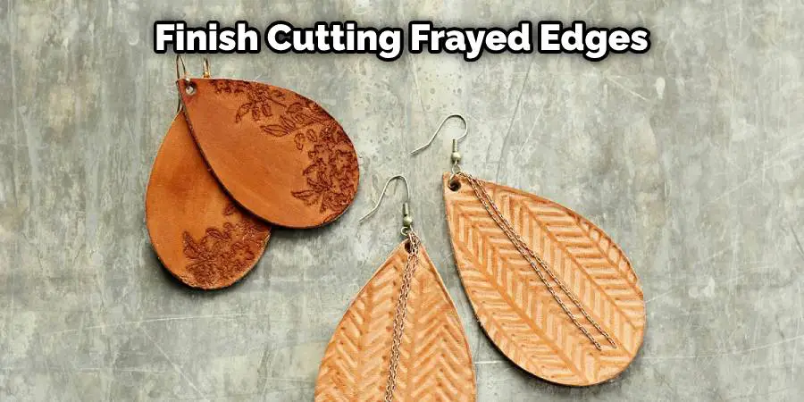 Finish cutting frayed edges