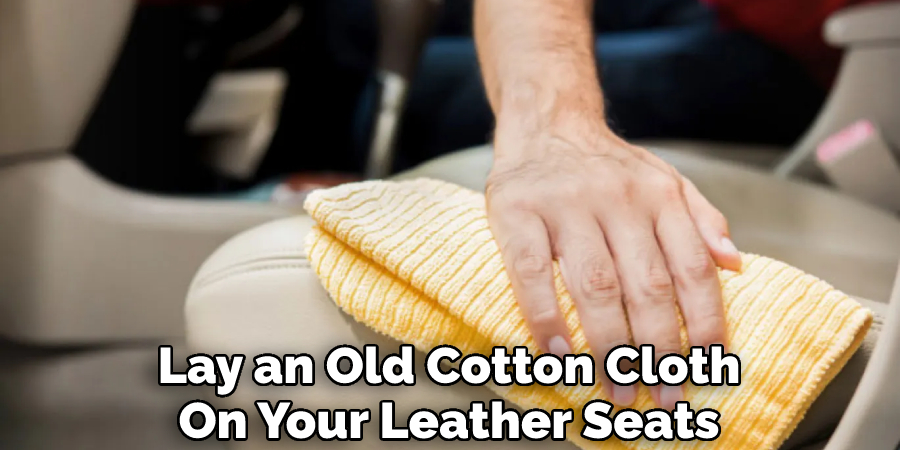 Lay an Old Cotton Cloth On Your Leather Seats