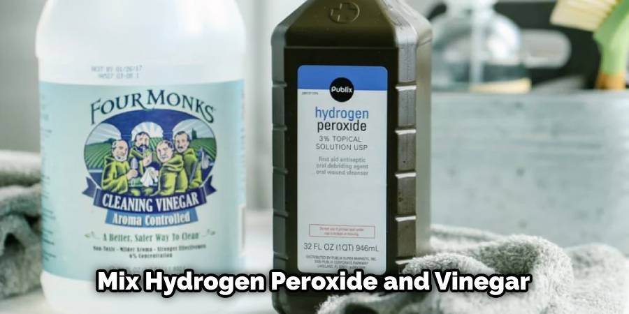 Mix hydrogen peroxide and vinegar
