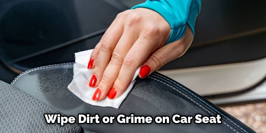 Wipe dirt or grime on car seat