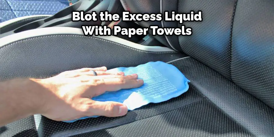 blot the excess liquid with paper towels