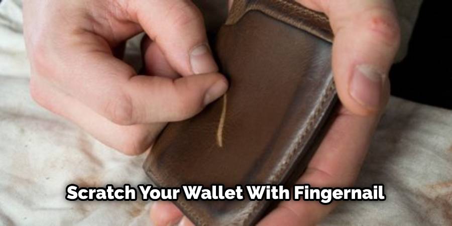 Scratch your wallet with fingernail