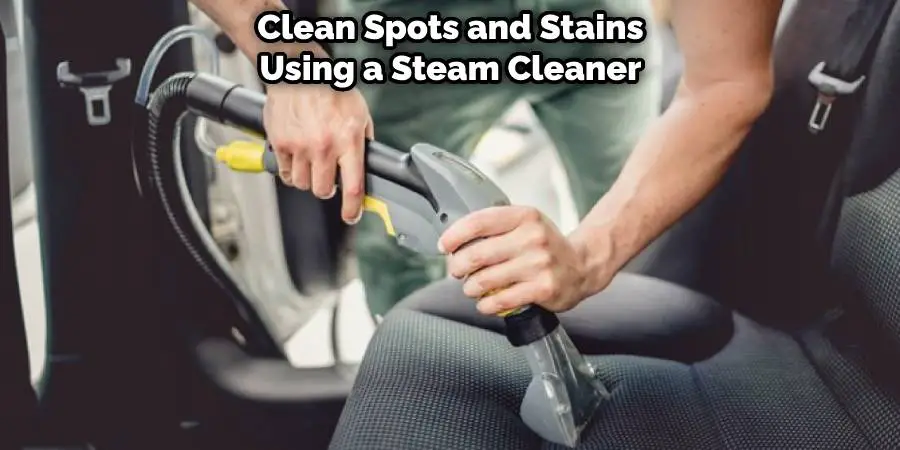 Clean spots and stains using a steam cleaner