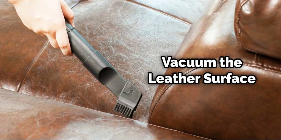 Vacuum the leather surface