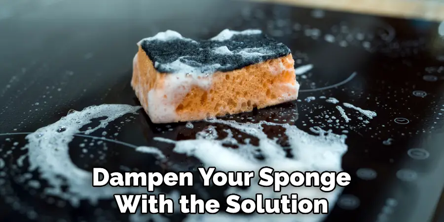 Dampen Your Sponge
With the Solution