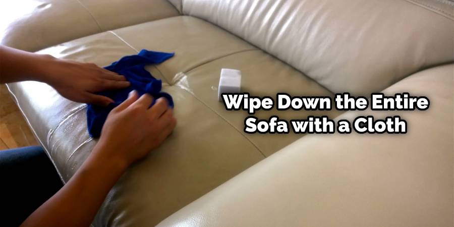Dip a Sponge Into Clean Water and Wipe Down the Entire Sofa