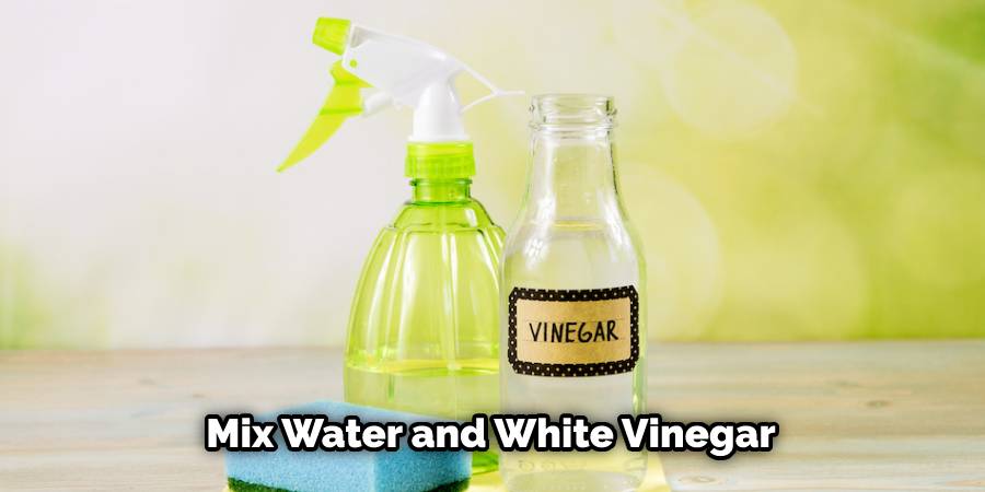 Mix equal parts of water and white vinegar