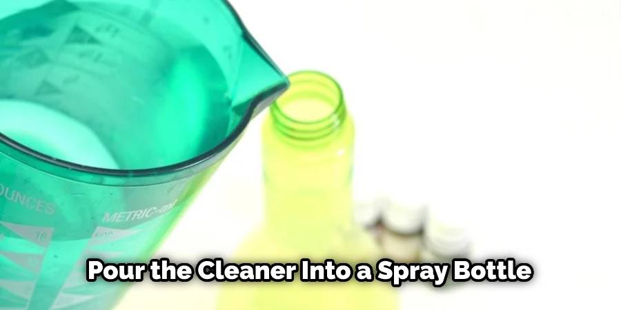 Pour the cleaner into a spray bottle