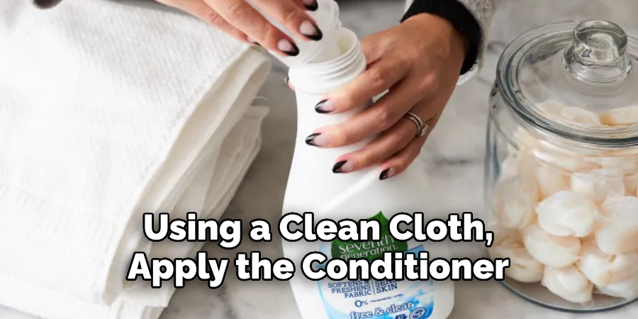 Using a Clean Cloth, Apply the Conditioner