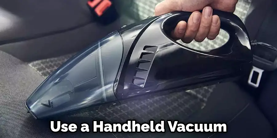 Use a Handheld Vacuum