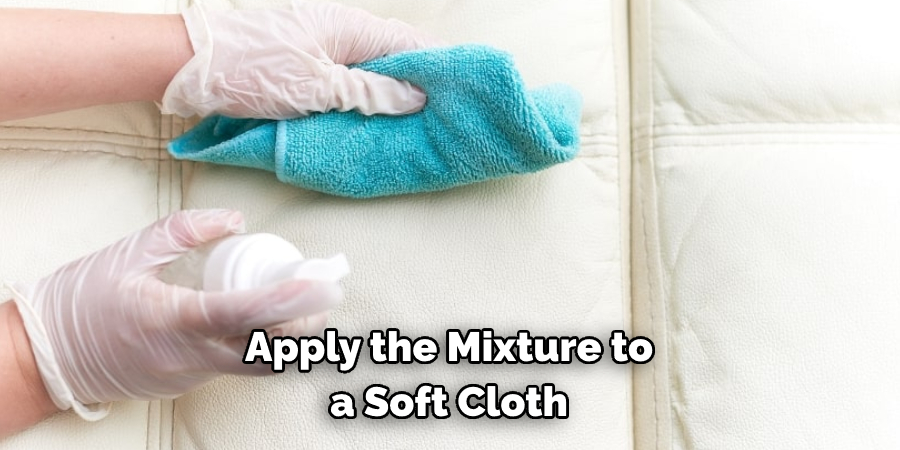 Apply the Mixture to a Soft Cloth