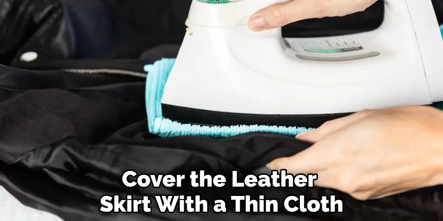 Cover the Leather Skirt With a Thin Cloth