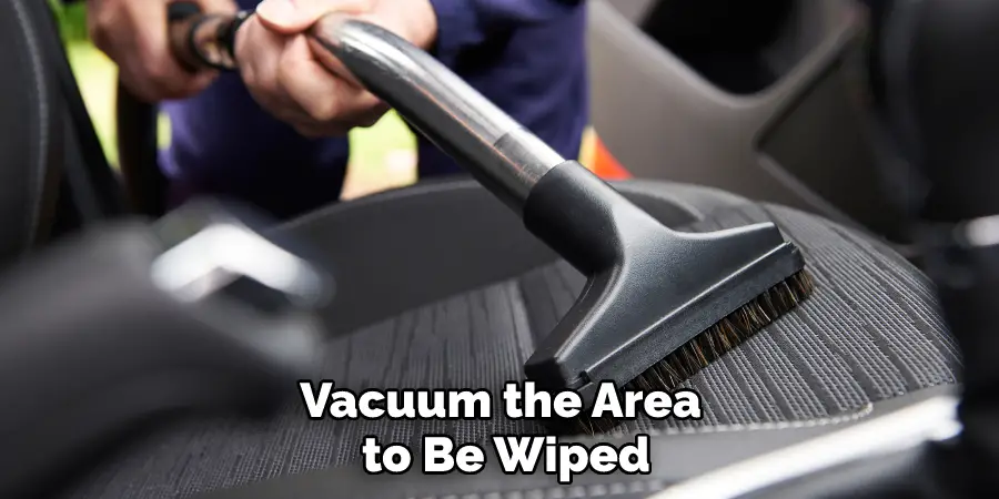 Vacuum the Area to Be Wiped