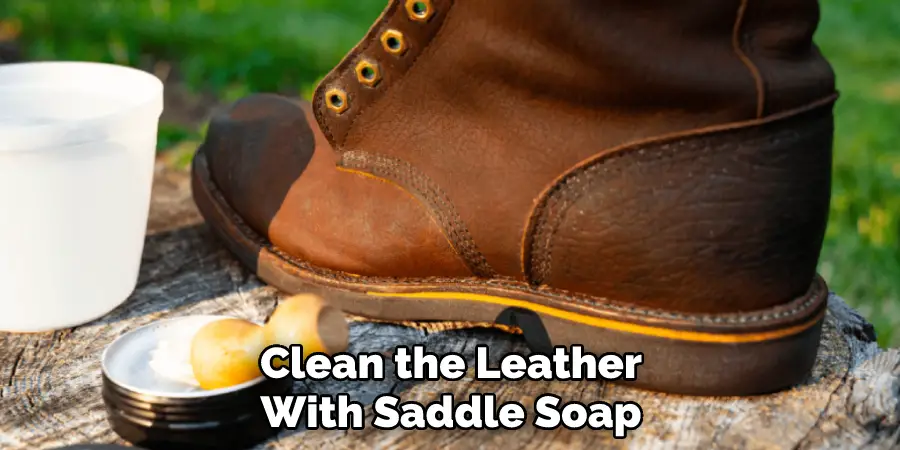 Clean the leather with saddle soap 