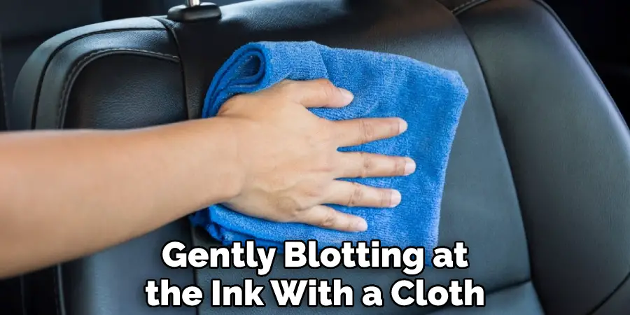 Gently Blotting at the Ink With a Cloth