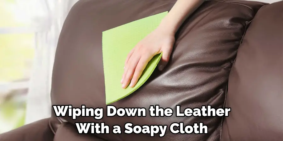 Wiping Down the Leather With a Soapy Cloth