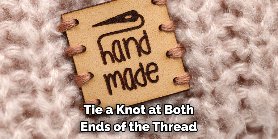Tie a Knot at Both 
Ends of the Thread
