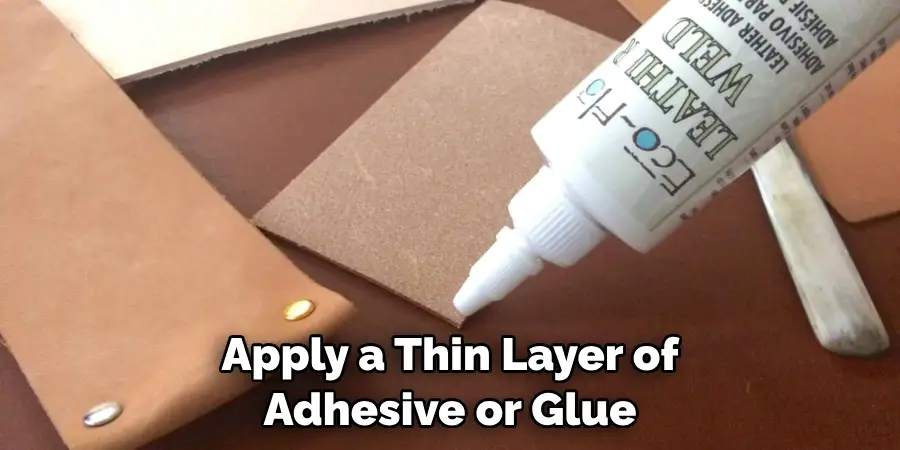 Apply a Thin Layer of Adhesive or Glue
