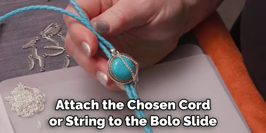 Attach the Chosen Cord or String to the Bolo Slide