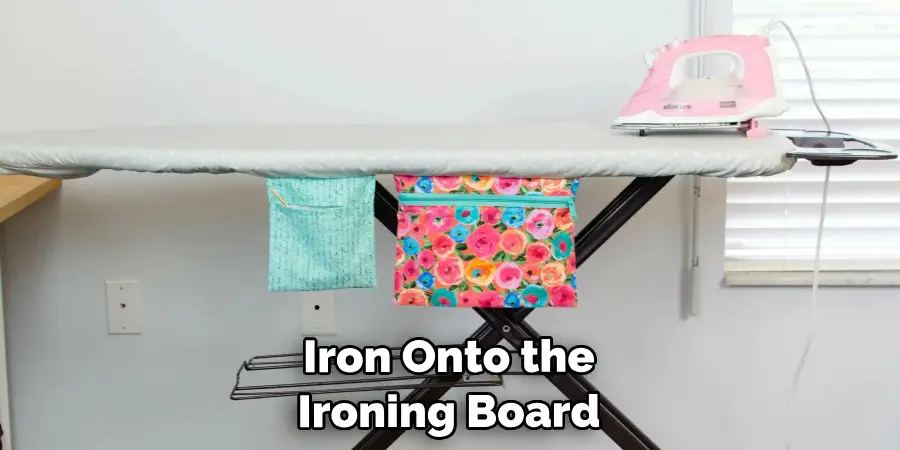 Iron Onto the Ironing Board 