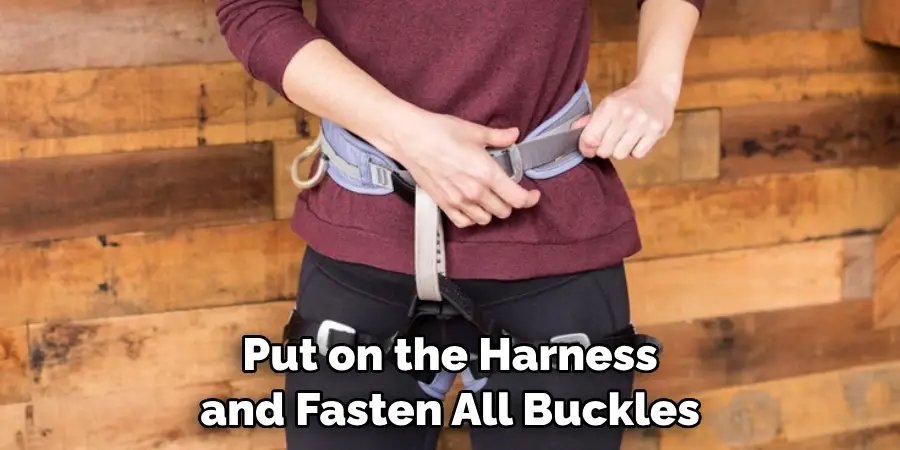 Put on the Harness and Fasten All Buckles