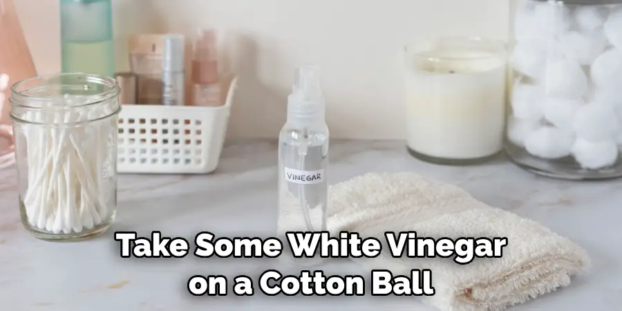 Take Some White Vinegar on a Cotton Ball