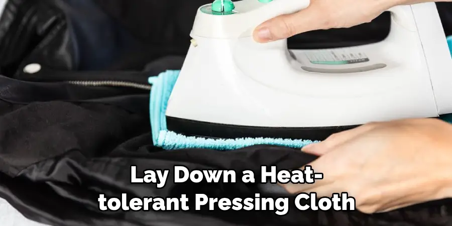 Lay Down a Heat-tolerant Pressing Cloth
