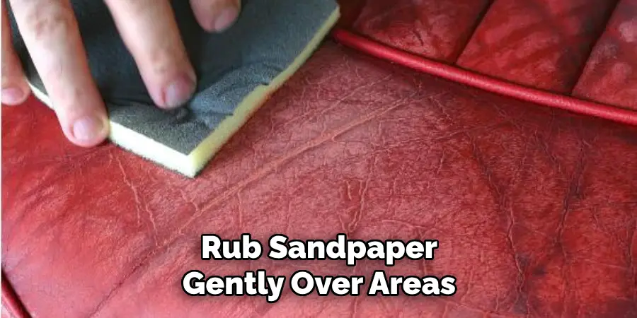 Rub Sandpaper Gently Over Areas of the Coat