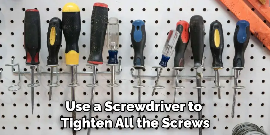 Use a Screwdriver to Tighten All the Screws