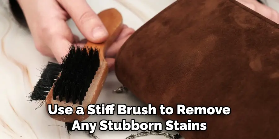 Use a Stiff Brush to Remove Any Stubborn Stains