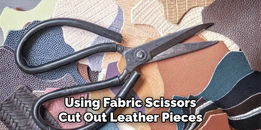 Using Fabric Scissors Cut Out Leather Pieces