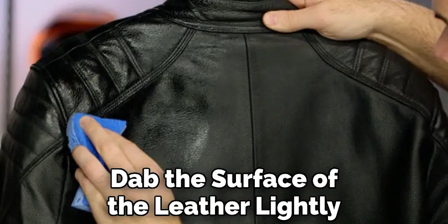 Dab the Surface of
the Leather Lightly
