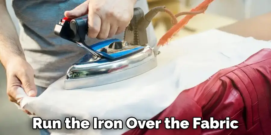 Run the Iron Over the Fabric 