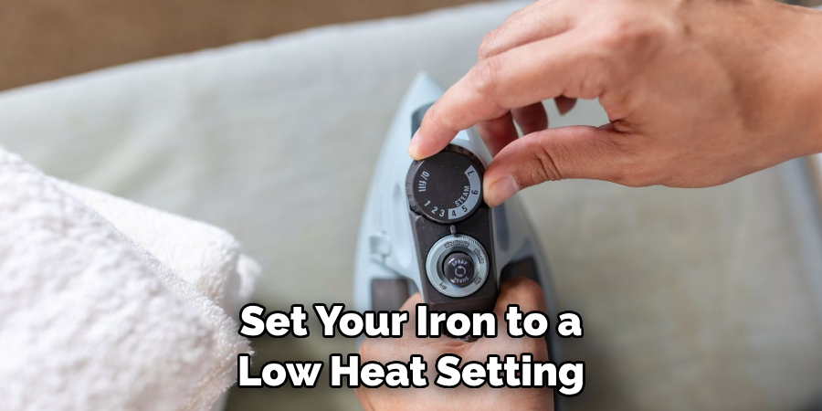 Set Your Iron to a Low Heat Setting