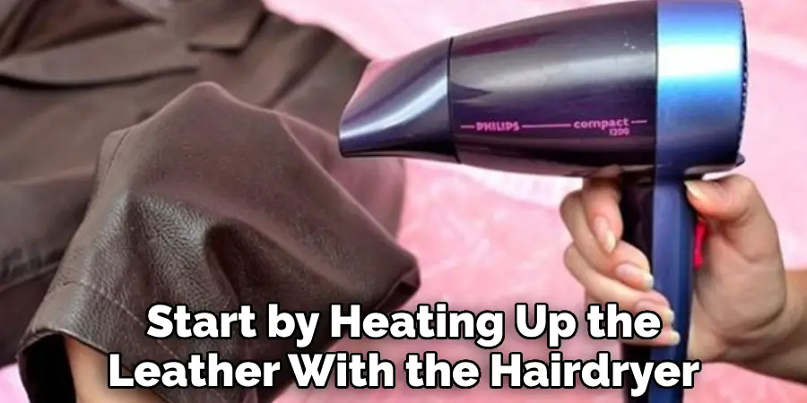 Start by Heating Up the Leather With the Hairdryer