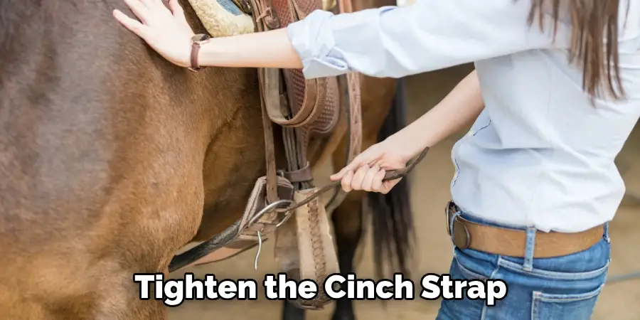 Tighten the Cinch Strap