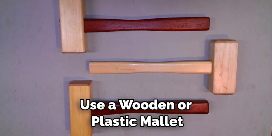 Use a Wooden or Plastic Mallet