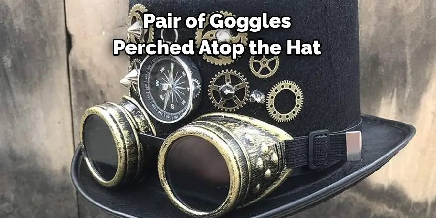 Pair of Goggles Perched Atop the Hat