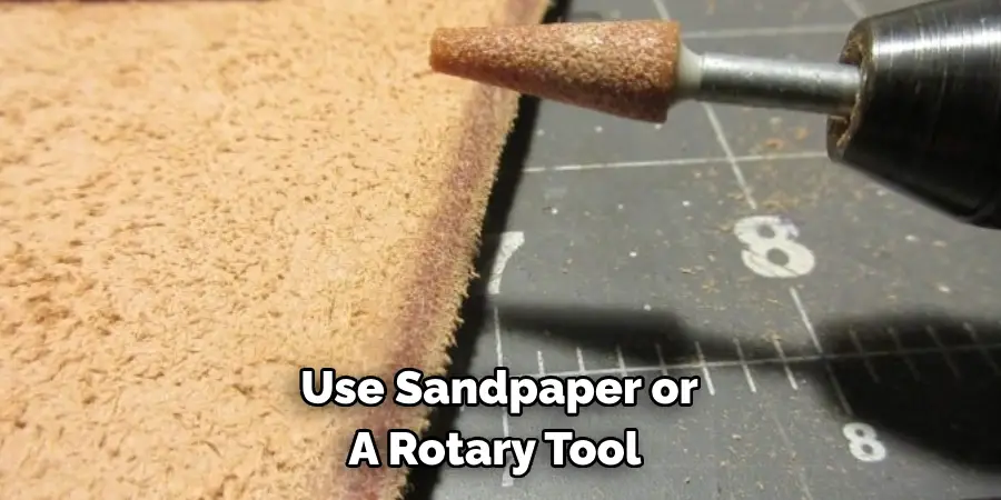 Use Sandpaper or 
A Rotary Tool 