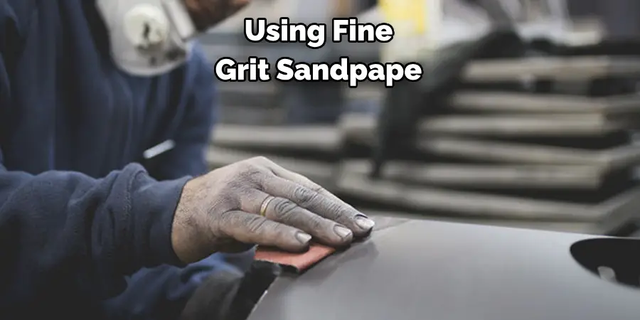 Using Fine Grit Sandpape