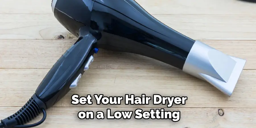  Set Your Hair Dryer on a Low Setting