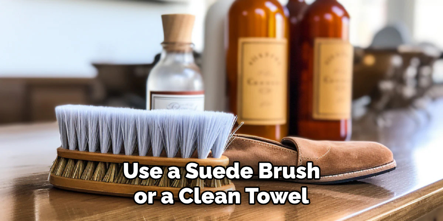 Use a Suede Brush or a Clean Towel