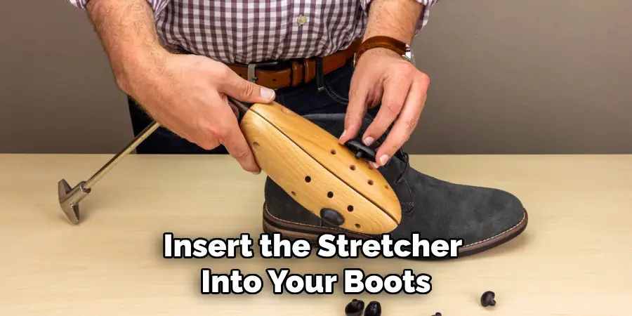 Insert the Stretcher Into Your Boots
