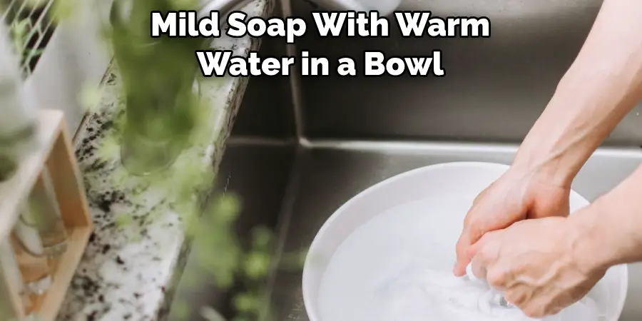 Mild Soap With Warm Water in a Bowl