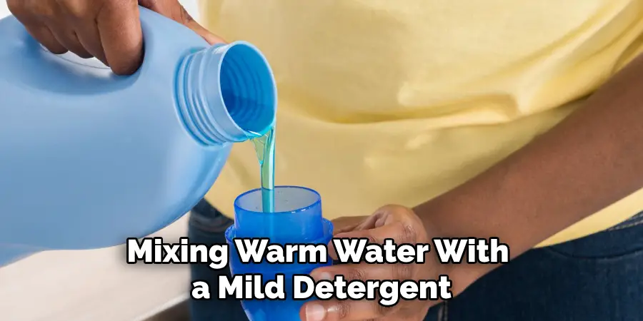 Mixing Warm Water With a Mild Detergent