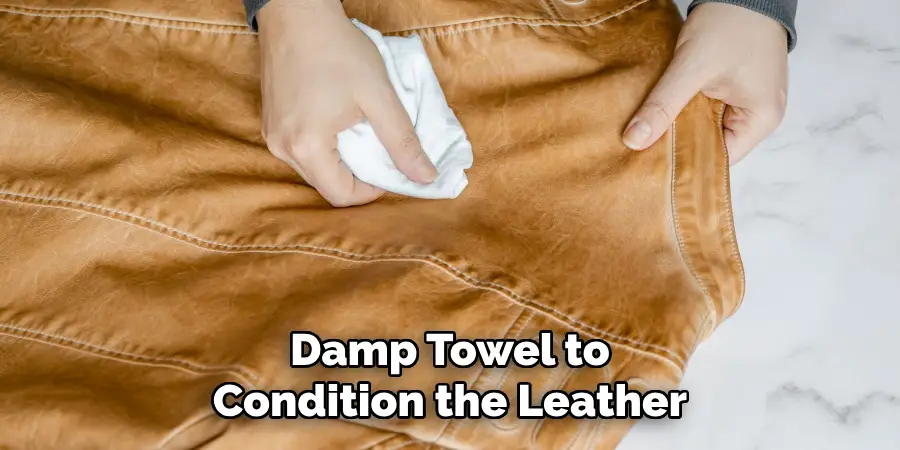 Damp Towel to Condition the Leather