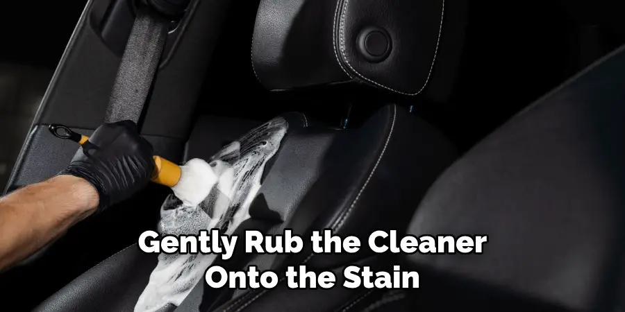 Gently Rub the Cleaner Onto the Stain