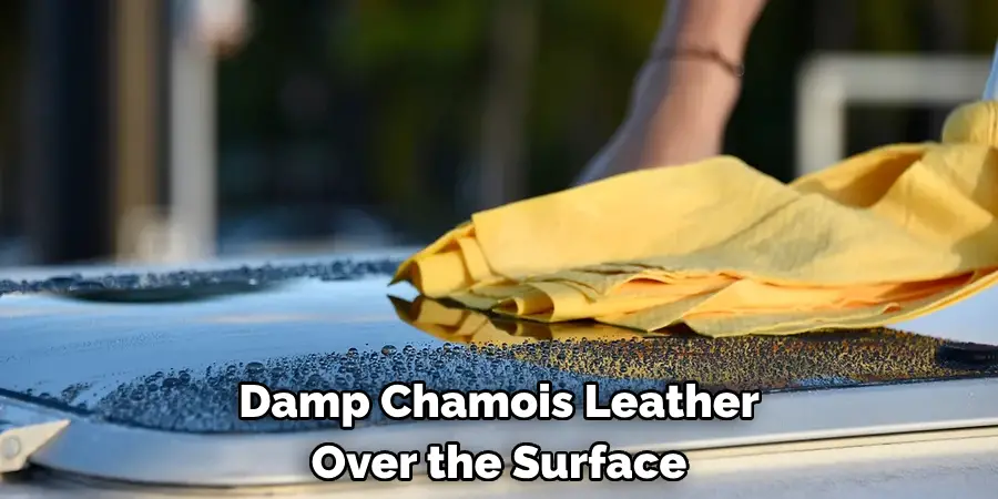 Damp Chamois Leather Over the Surface