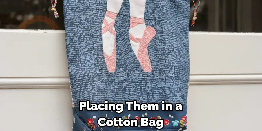 Placing Them in a Cotton Bag