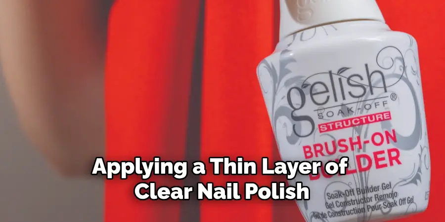 Applying a Thin Layer of Clear Nail Polish